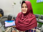 Yanmi Greath Malinda (46), pulih dari DBD pengobatannya dibiayai Program JKN. (Ist)