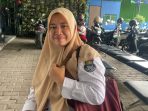 Yuliana, (38) warga Pondok Aren, Pegawai Dinas Tenaga Kerja telah merasakan manfaat dari Program JKN sekama 12 tahun. (ist).